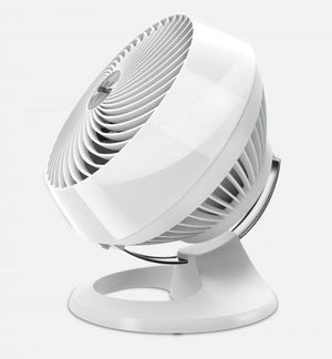 White Vornado air circulator fan on a circular base