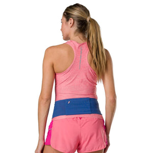 Woman wearing a blue Nathan running belt around her waist
