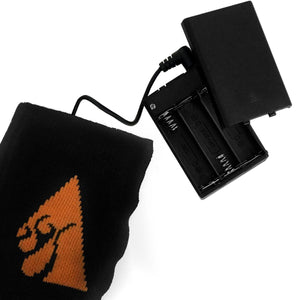 ActionHeat battery pack connected to a black fabric heating element