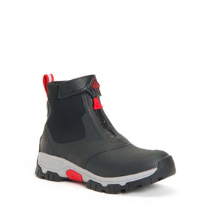 Muck black ankle boot with front zipper closure and grey and red sole