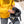 Person installing Outdoor Tech audio chip into ski helmet ear pad