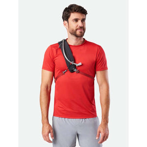 Man wearing a Nathan hydration sling over his shoulder