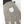 Close up of Hestra glove with textured grey fabric and brand logo patch