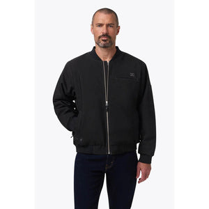 Man wearing a black Mobile Warming bomber jacket with a front zipper and chest pocket
