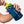 Hand holding a Nathan energy gel flask with Gluko lemon lime energy liquid
