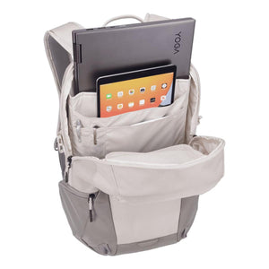 Open Thule backpack showing internal laptop and tablet compartments