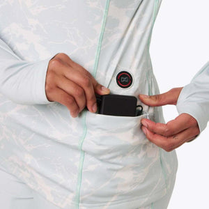 Mobile Warming heated shirt with battery being inserted into side pocket