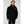 Man wearing a black Helly Hansen rain jacket with HH logo