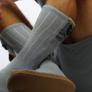 FNDN grey heated socks with battery control button on cuff