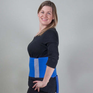 Woman wearing a blue Polar Products cooling waist wrap
