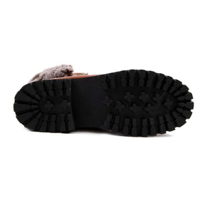 Cloud Nine Sheepskin boot showing the black lugged rubber sole