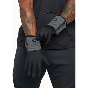 FNDN black and grey heated gloves with zippered cuffs worn on hands