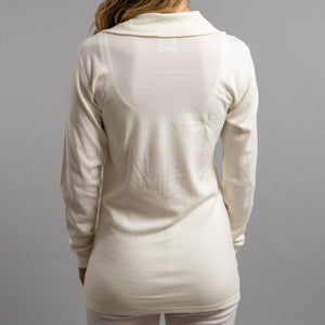 Back view of a Merino Skins cream long sleeve top with a cowl neck