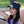 Woman wearing a black Mission visor