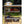 Snow Peak metal storage baskets attached to a camping table holding cookware and food items