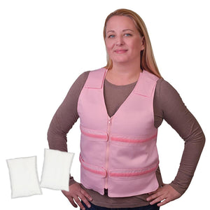 Woman wearing a pink Polar Products cooling vest with two white ice packs