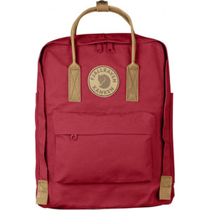 Red Fjallraven Kanken backpack with tan leather handles and logo patch