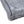 Close up of grey faux fur blanket corner