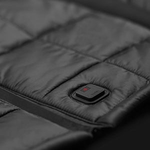 Black Racer branded power button on quilted fabric