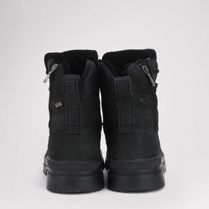 Back view of black Pajar winter boots with side zippers and pull tabs