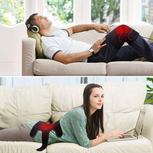 Person using a heated knee wrap and another person using a heated back wrap on a sofa