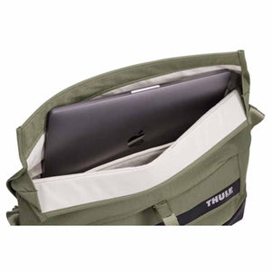Open Thule bag showing internal laptop sleeve with laptop inside