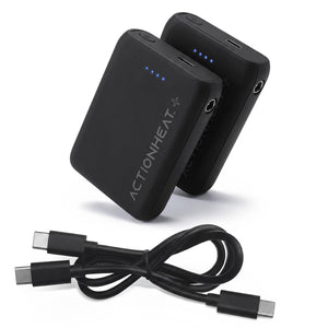 Two black ActionHeat power banks with charging cables