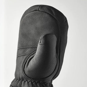 Hestra black leather mitten showing thumb detail
