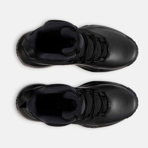 Top view of a pair of black athletic sneakers with laces