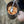 Snow Peak titanium pot filled with pasta and tomato sauce being stirred with a metal spoon