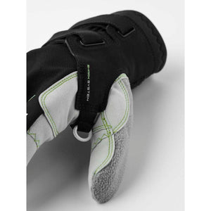 Hestra glove showing Shark System loop attachment on grey suede palm