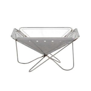 Snow Peak stainless steel collapsible fire pit on a wire frame stand