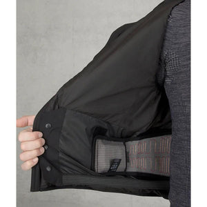 Interior view of Lenz heated vest showing heating element and battery pocket