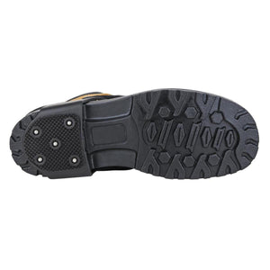 Black rubber ice cleat attached to the sole of a work boot