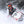 Person wearing 509 helmet and gear riding a snowmobile through deep snow