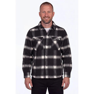 Man wearing a black and white plaid Mobile Warming flannel shirt