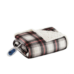 Woolrich plaid heated throw blanket with white sherpa lining and controller