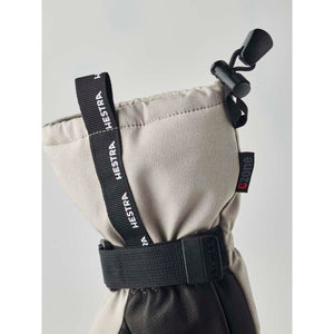 Hestra glove cuff with adjustable drawstring and wrist strap
