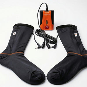 California Heat black heated socks with orange battery pack and connecting cables