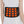 UTK Technology heating pad belt with glowing red heat nodes worn around the waist