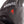 Zanier black glove detail with flame icon and push button