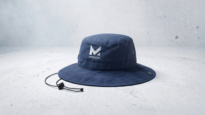 A navy blue bucket hat with a white 