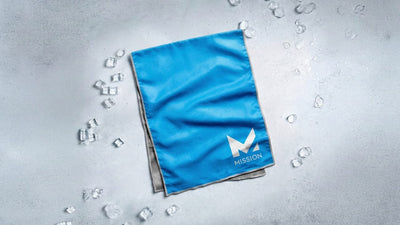A blue cooling towel with a white 