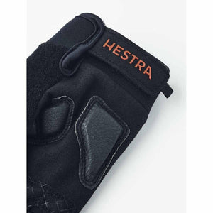 Hestra black glove with velcro strap and logo