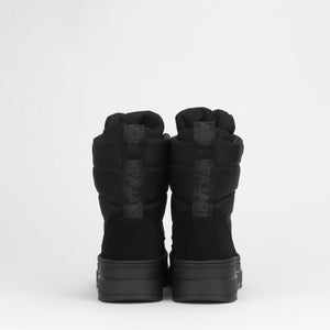 Back view of black Pajar winter boots with quilted shaft and branded pull tab
