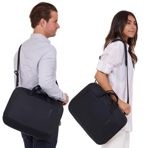 Man and woman carrying black Thule laptop briefcases with shoulder straps