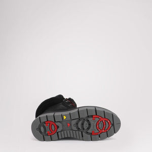 Pajar winter boot with grey lugged rubber outsole and red ice grip traction cleats