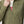 Close up of FjallRaven olive green fleece jacket with zippered chest pocket