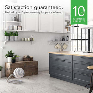 Vornado fan on kitchen floor with 10 year satisfaction guarantee graphic