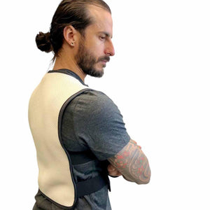 Man wearing an Oro Sports beige mesh back support brace over a grey t-shirt